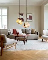 DC Textile Pendel Stengrå fra Halo Design over et sofabord i en stue - blød hygge ved sofaen